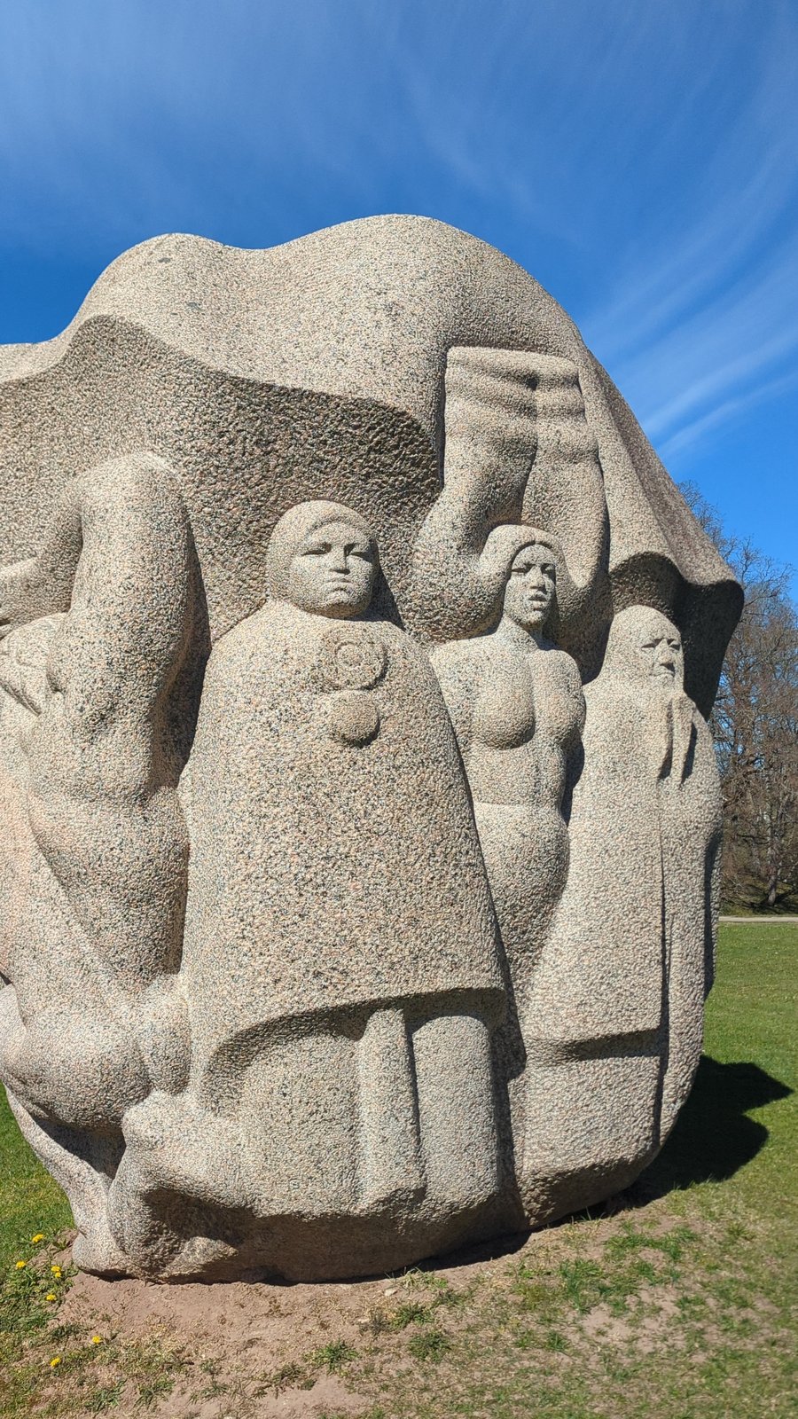 Three granite figures sculpted by Indulis Ranka at the Hill of Dainas, Turaida