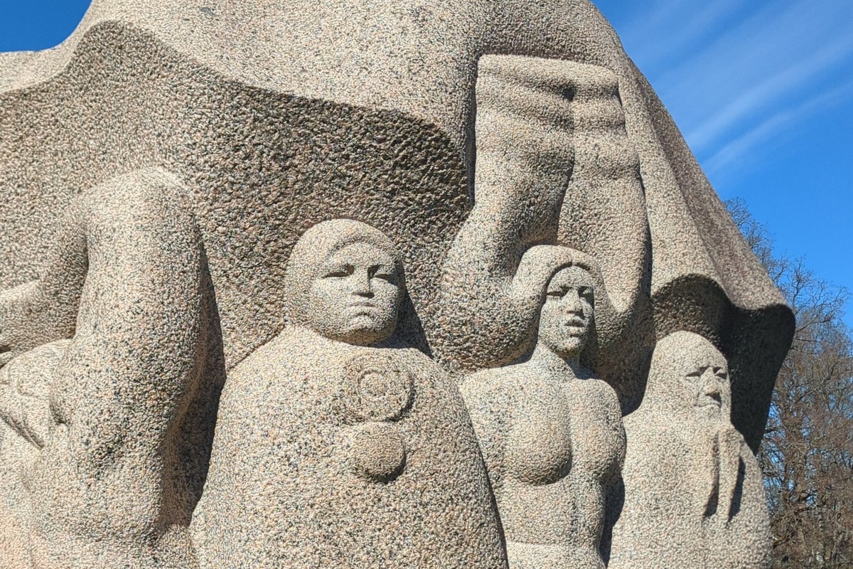 Three granite figures at Dainu kalns, the Hill of Dainas, Turaida, Latvia (sculpture by Indulis Ranka)