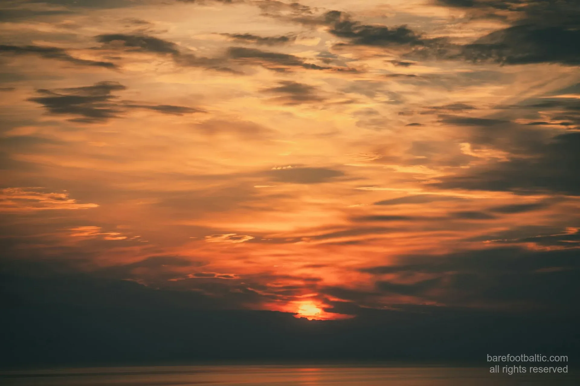 Golden sunset over the Baltic Sea at Jurmala beach